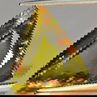 Natural Multi Color Sphene 12.99 Ct. Trilliant Shape 18 x 16.6 Mm. Gemstone Unheated: Product ID: 806505709 Product Name: Natural Sphene Weight: 12.99 CT. Size: 18 x 16.6 x 7 MM. Shape: Trilliant Color: Multi Color With Red Spark Clarity:SI Luster: Adamantine Gems Origin: Madagascar Tr