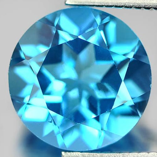 Natural Swiss Blue Topaz 3.35 Ct. Round Shape 9.1 Mm. Gemstone From Brazil: Product ID: 807156051 Product Name: Natural Blue Topaz Weight: 3.35 CT. Size: 9.1 x 9.1 x 5.8 MM. Shape: Round Color: Swiss Blue Clarity:SI Luster: Good Gems Origin: Brazil Treatment: Treated Crystal