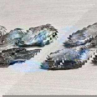 Natural Unheated Greenish Blue Sapphire 3.33 Ct. 5 Pcs Rough Shape Gemstones From Madagascar: Product ID: 806162543 Product Name: Natural Green Sapphire Weight: 3.33 CT. Size: 5.9 x 4.6 x 1.6 to 9.7 x 5.4 x 2.1 MM. Shape: Rough Mixed Shape Color: Greenish Blue Clarity:VSI Luster: Good Gems Ori