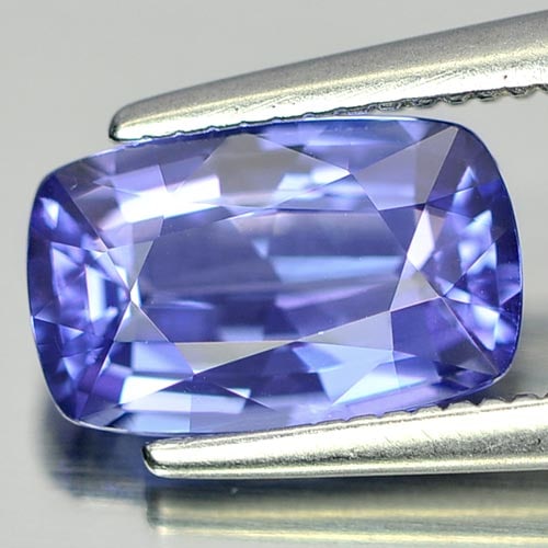Natural Violetish Blue Tanzanite 1.76 Ct. Clean Cushion Shape 9.1 x 5.7 Mm. Gemstone From Tanzania: Product ID: 807006571 Product Name: Natural Tanzanite Weight: 1.76 CT. Size: 9.1 x 5.7 x 3.9 MM. Shape: Cushion Color: Blue Clarity:IF Luster: Very Good Gems Origin: Tanzania Treatment: Heated Crystal