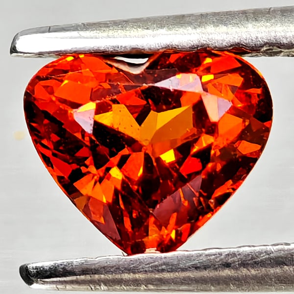 Natural Orangish Red Spessartine Garnet 0.96 Ct. Heart Shape 6.3 x 5.3 Mm Gemstone From Namibia: Product ID: 802936819 Product Name: Natural Spessartine Weight: 0.96 CT. Size: 6.3 x 5.3 x 3.8 MM. Shape: Heart Shape Color: Orangish Red Clarity:VSI Luster: Good Gems Origin: Namibia,Africa Treatment