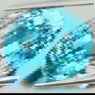Natural Swiss Blue Topaz 25.31 Ct. VVS Oval Checkerboard Cut 18.7 x 15.8 Mm. Gemstone From Brazil: Product ID: 807158656 Product Name: Natural Blue Topaz Weight: 25.31 CT. Size: 18.7 x 15.8 x 11.8 MM. Shape: Oval Checkerboard Color: Blue Clarity:VVS Luster: Very Good Gems Origin: Brazil Treatment: