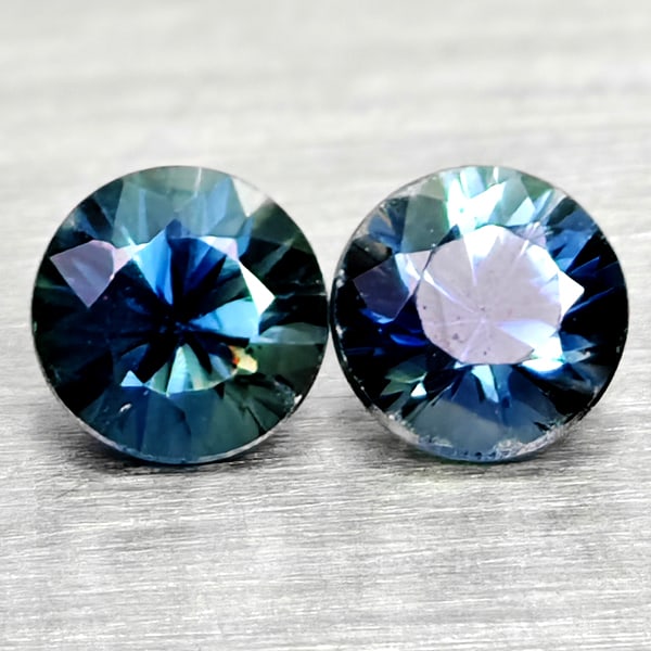 Natural Blue Sapphire 0.41 Ct. 2 Pcs Round Diamand Cut 3.4 Mm Gemstones From Tanzania: Product ID: 806162247 Product Name: Natural Green Sapphire Weight: 0.41 CT. Size: 3.4 x 3.4 x 2.4 MM. Shape: Round Diamond Cut Color: Fancy Color Clarity:VSI Luster: Very Good Gems Origin: Tanzania Tr