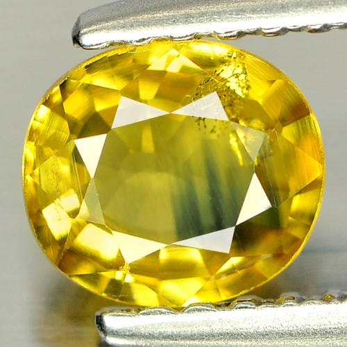 Natural Bluish Yellow Sapphire 0.70 Ct. Oval Shape 5.7 x 5.3 Mm Gemstone From Thailand: Product ID: 806133125 Product Name: Natural Green Sapphire Weight: 0.70 CT. Size: 5.7 x 5.3 x 2.6 MM. Shape: Oval Color: Bluish Yellow Clarity:SI Luster: Good Gems Origin: Thailand Treatment: Heated C