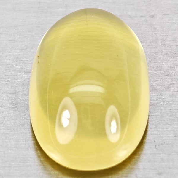 Natural Yellow Lemon Quartz 10.02 Ct. Oval Cabochon Shape 11 x 17.3 Mm Gemstone From Brazil: Product ID: 805530082 Product Name: Natural Quartz Weight: 10.02 CT. Size: 17.3 x 11 x 7.5 MM. Shape: Oval Cabochon Color: Yellow Lemon Clarity:Semi - Transparent Luster: Good Gems Origin: Brazil Trea