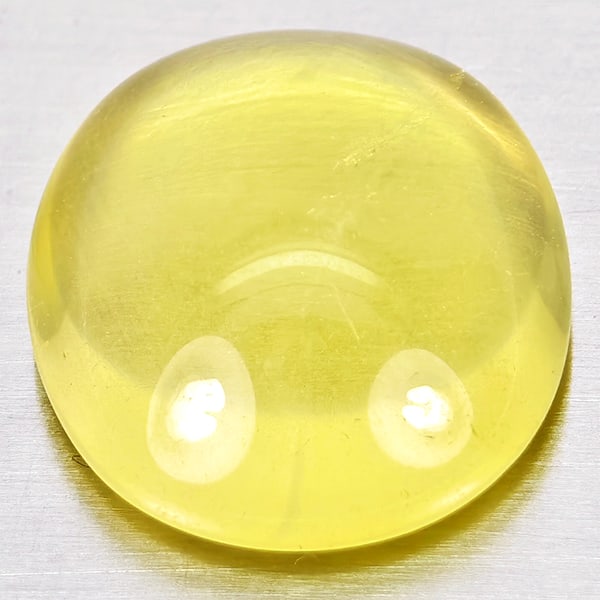 Natural Yellow Lemon Quartz 8.76 Ct. Oval Cabochon Shape 15.5 x 13.5 Mm Gemstone From Brazil: Product ID: 805530014 Product Name: Natural Quartz Weight: 8.76 CT. Size: 15.5 x 13.5 x 6.5 MM. Shape: Oval Cabochon Color: Yellow Lemon Clarity:Semi - Transparent Luster: Good Gems Origin: Brazil Tre