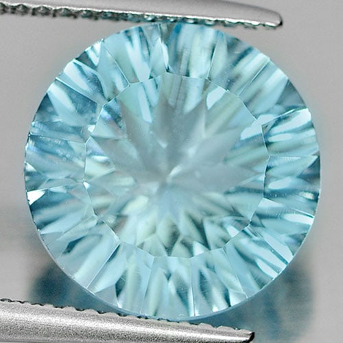 Natural Blue Topaz 7.13 Ct. Clean Round Cornflower Cut 11.9 Mm Gemstone From Brazil: Product ID: 807165835 Product Name: Natural Blue Topaz Weight: 7.13 CT. Size: 11.9 x 11.9 x 7 MM. Shape: Round Cornflower Cut Color: Blue Clarity:IF Luster: Very Good Gems Origin: Brazil Treatment: Tr