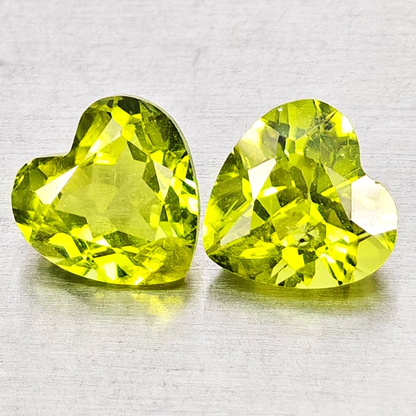 Natural Green Peridot 1.76 Ct. 2 Pcs Heart Shape 6 x 6 Mm Gemstones From Pakistan: Product ID: 805317321 Product Name: Natural Peridot Weight: 1.76 CT. Size: 6 x 6 x 3.6 MM. Shape: Heart Shape Color: Green Clarity:VSI - SI1 Luster: Good Gems Origin: Pakistan Treatment: Unheated Crys