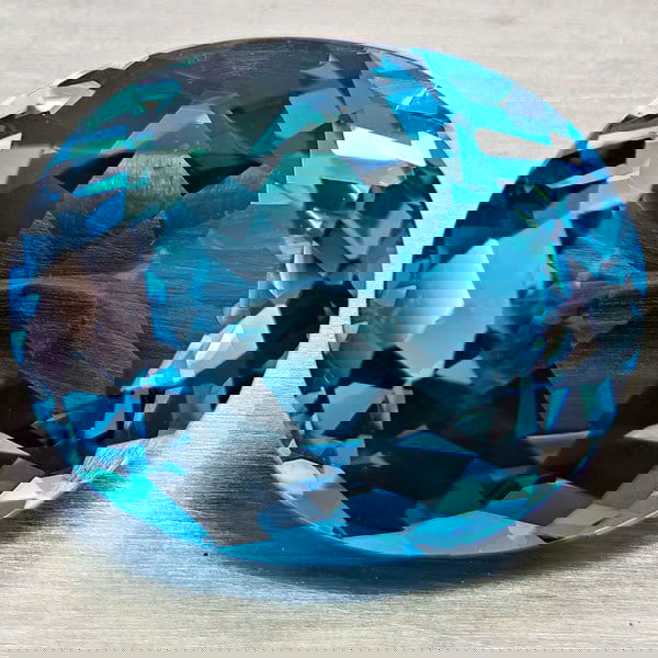 Natural London Blue Topaz 4.79 Ct. Oval Shape 9.3 x 11.4 Mm Gemstone From Brazil: Product ID: 807168412 Product Name: Natural Blue Topaz Weight: 4.79 CT. Size: 9.3 x 11.4 x 5.7 MM. Shape: Oval Color: London Blue Clarity:VVS - VSI Luster: Very Good Gems Origin: Brazil Treatment: Tre