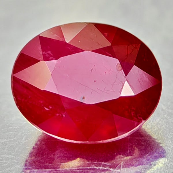 Natural Red Ruby 3.92 Ct. Oval Shape 8 x 9.8 Mm. Gemstone From Madagascar: Product ID: 805935044 Product Name: Natural Ruby Weight: 3.92 CT. Size: 8 x 9.8 x 5.6 MM. Shape: Oval Color: Red Clarity:VSI Luster: Good Gems Origin: Madagascar Treatment: Heated Lead-glass filling C
