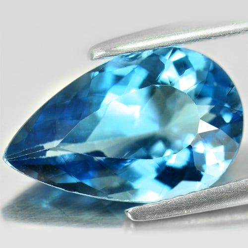 Natural London Blue Topaz 4.24 Ct. Pear Shape 14 x 8.8 Mm. Gemstone From Brazil: Product ID: 807157411 Product Name: Natural Blue Topaz Weight: 4.24 CT. Size: 14 x 8.8 x 5.2 MM. Shape: Pear Color: London Blue Clarity:VSI Luster: Good Gems Origin: Brazil Treatment: Treated Crystal