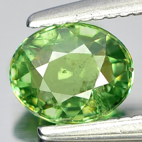 Natural Green Demantoid Garnet 0.71 Ct. Oval Shape 5.8 x 4.8 Mm. Gemstone From Madagascar: Product ID: 802912876 Product Name: Natural Demantoid Weight: 0.71 CT. Size: 5.8 x 4.8 x 2.8 MM. Shape: Oval Color: Green Clarity:SI Luster: Good Gems Origin: Madagascar Treatment: Unheated Crystal St