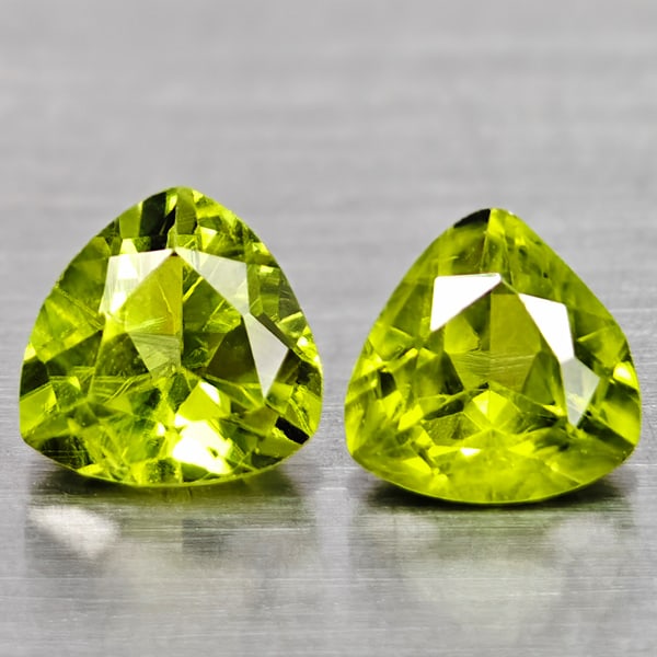 Natural Green Peridot 1.60 Ct. 2 Pcs. Trilliant Shape 6 Mm Gemstones From Pakistan: Product ID: 805317074 Product Name: Natural Peridot Weight: 1.60 CT. Size: 6 x 6 x 3.7 MM. Shape: Trilliant Color: Green Clarity:VSI Luster: Good Gems Origin: Pakistan Treatment: Unheated Crystal Stru