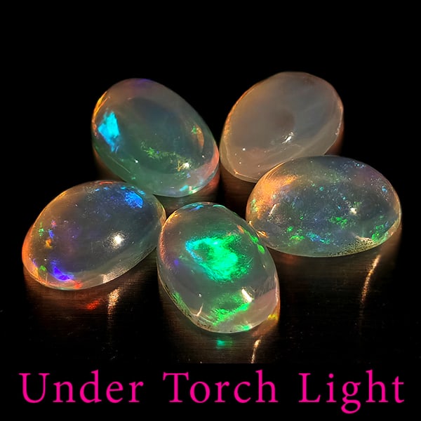 Natural Multi Color Opal 1.42 Ct. 5 Pcs Oval Cabochon Shape 6.1 x 4.2 Mm Gemstones From Ethiopia: Product ID: 818728085 Product Name: Natural Opal Weight: 1.42 CT. Size: 6.1 x 4.2 x 2.1 MM. Shape: Oval Cabochon Color: Multi-Color Clarity:Semi - Transparent Luster: Good Gems Origin: Ethiopia Treatm