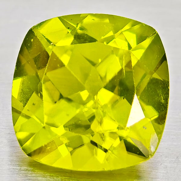 Natural Green Peridot 1.46 Ct. Cushion Shape 7 Mm Gemstone From Pakistan: Product ID: 805317259 Product Name: Natural Peridot Weight: 1.46 CT. Size: 7 x 7 x 4.3 MM. Shape: Cushion Shape Color: Green Clarity:VSI - SI1 Luster: Good Gems Origin: Pakistan Treatment: Unheated Cr