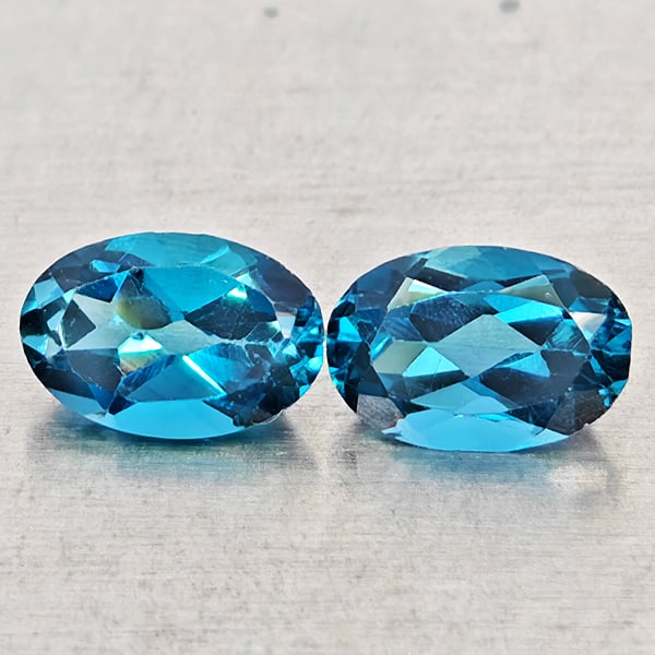 Natural London Blue Topaz 1.06 Ct. 2 Pcs Oval Shape 6 x 4 Mm Gemstones From Brazil: Product ID: 807168443 Product Name: Natural Blue Topaz Weight: 1.06 CT. Size: 6 x 4 x 2.8 MM. Shape: Oval Shape Color: London Blue Clarity:VSI - SI1 Luster: Good Gems Origin: Brazil Treatment: Treated