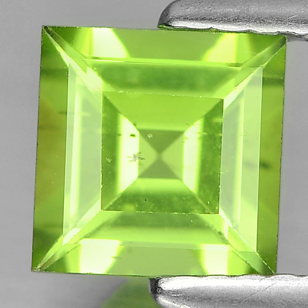 Natural Green Peridot 1.13 Ct. Square Shape 6 x 6 Mm. Gemstone Unheated: Product ID: 805315975 Product Name: Natural Peridot Weight: 1.13 CT. Size: 6 x 6 x 3.8 MM. Shape: Square Color: Green Clarity:SI1 Luster: Good Gems Origin: Pakistan Treatment: Unheated Crystal Structu