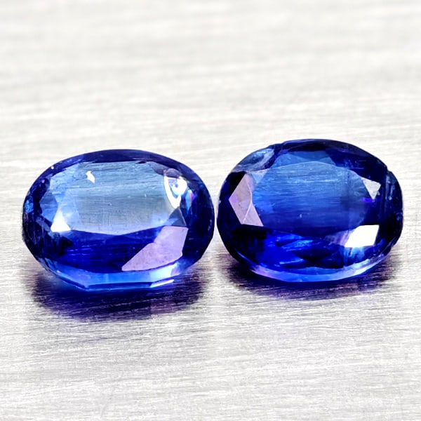 Natural Blue Kyanite 0.93 Ct. 2 Pcs Oval Shape Gemstones From Sri - Lanka: Product ID: 804204812 Product Name: Natural Kyanite Weight: 0.93 CT. Size: 5.1 x 4 x 2.3 to 5 x 4 x 2.2 MM. Shape: Oval Color: Blue Clarity:VSI - SI1 Luster: Good Gems Origin: Sri - Lanka Treatment: U
