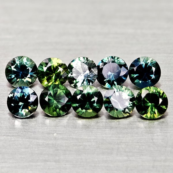Natural Fancy Color Sapphire 1.28 Ct. 10 Pcs Round Diamand Cut 3 Mm. Gemstones From Tanzania: Product ID: 806162155 Product Name: Natural Green Sapphire Weight: 1.28 CT. Size: 3 x 3 x 2.1 MM. Shape: Round Diamond Cut Color: Fancy Color Clarity:VSI Luster: Very Good Gems Origin: Tanzania Treatm
