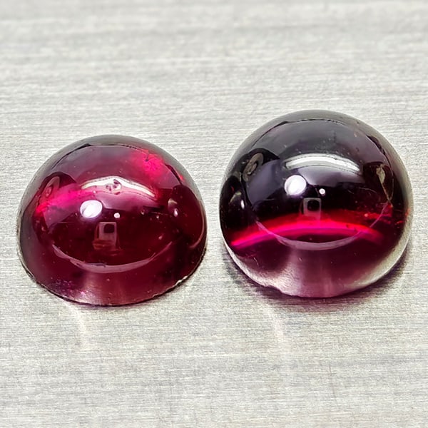 Natural Purplish Pink Rhodolite Garnet 1.95 Ct. 2 Pcs Round Cabochon Shape 5 Mm Gemstone from: Product ID: 802936748 Product Name: Natural Rhodolite Weight: 1.95 CT. Size: 5 x 5 x 2.7 to 5.1 x 5.1 x 3.5 MM. Shape: Round Cabochon Color: Purplish Pink Clarity:Semi - Transparent Luster: Good Gems 