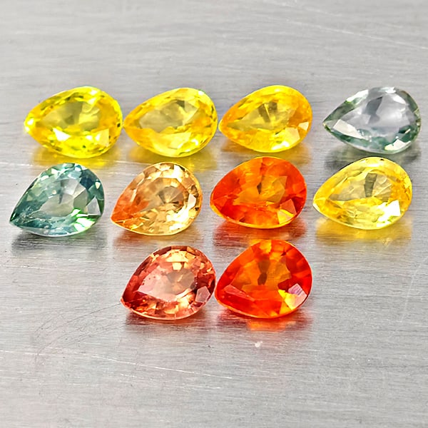 Natural Fancy Color Sapphire 1.70 Ct. 10 Pcs Pear Shape Gemstones From Tanzania: Product ID: 806162744 Product Name: Natural Fancy Color Sapphire Weight: 1.70 CT. Size: 4 x 2.8 x 1.6 MM. Shape: Pear Shape Color: Fancy Color Clarity:VVS - VSI Luster: Very Good Gems Origin: Tanzania