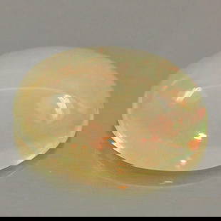 Natural Multi Color Play Of Colour Opal 0.80 Ct. Oval Cabochon Shape 8 x 5.9 Mm Gemstone From: Product ID: 818726319 Product Name: Natural Opal Weight: 0.80 CT. Size: 8 x 5.9 x 3.6 MM. Shape: Oval Cabochon Color: Multi Color Clarity:Semi - Transparent Luster: Iridescent Gems Origin: Ethiopia Tr