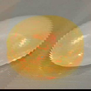 Natural Multi Color Play Of Colour Opal 0.74 Ct. 7.9 x 6.1 Mm Gemstone From Ethiopia: Product ID: 818726323 Product Name: Natural Opal Weight: 0.74 CT. Size: 7.9 x 6.1 x 3.6 MM. Shape: Oval Cabochon Color: Multi Color Clarity:Semi - Transparent Luster: Iridescent Gems Origin: Ethiopia
