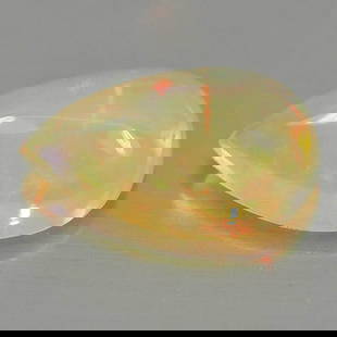 Natural Multi Color Play Of Colour Opal 0.56 Ct. Pear Cabochon Shape 8.2 x 5.2 Mm Gemstone From: Product ID: 818726321 Product Name: Natural Opal Weight: 0.56 CT. Size: 8.2 x 5.2 x 3.4 MM. Shape: Pear Cabochon Color: Multi Color Clarity:Semi - Transparent Luster: Iridescent Gems Origin: Ethiopia