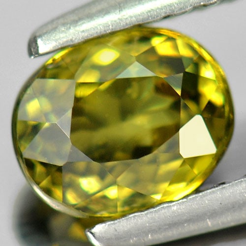Natural Multi Color Demantoid Garnet 1.07 Ct. Oval Shape 6.3 x 5.2 Mm. Unheated Gemstone From: Product ID: 802922465 Product Name: Natural Demantoid Weight: 1.07 CT. Size: 6.3 x 5.2 x 3.7 MM. Shape: Oval Color: Green Clarity:SI Luster: Very Good Gems Origin: Mardagascar Treatment: Unheated Crys