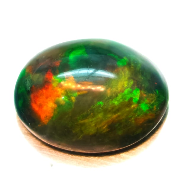 Natural Multi-Color Opal 1.51 Ct. Oval Cabochon Shape 8.8 x 6.8 Mm. Unheated Gemstone: Product ID: 818728033 Product Name: Natural Opal Weight: 1.51 CT. Size: 8.8 x 6.8 x 4.4 MM. Shape: Oval Cabochon Color: Multi-Color Clarity:Semi - Transparent Luster: Iridescent Gems Origin: Ethiopia