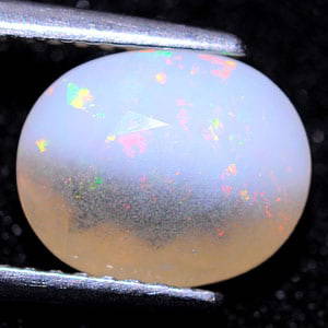Natural Multi Color Opal 1.73 Ct. Oval Shape 9.6 x 7.8 Mm Gemstone from Ethiopia: Product ID: 818709805 Product Name: Natural Opal Weight: 1.73 CT. Size: 9.6 x 7.8 x 5.4 MM. Shape: Oval Color: Multi Color Clarity:Semi - Transparent Luster: Good Gems Origin: Ethiopia Treatment: Unhe