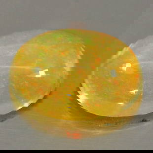 Natural Multi Color Play Of Colour Opal 0.80 Ct. Oval Cabochon Shape 8.1 x 6.1 Mm Gemstone From: Product ID: 818726326 Product Name: Natural Opal Weight: 0.80 CT. Size: 8.1 x 6.1 x 3.5 MM. Shape: Oval Cabochon Color: Multi Color Clarity:Semi - Transparent Luster: Iridescent Gems Origin: Ethiopia