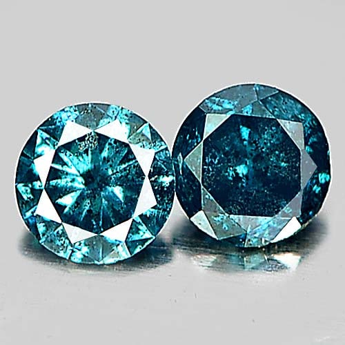 Natural Blue Loose Diamond 0.16 Ct. 2 Pcs. Round Brilliant Cut 2.7 Mm Gemstone From Belgium: Product ID: 802103135 Product Name: Natural Enhanced Diamond Weight: 0.16 CT. Size: 2.7 x 2.7 x 1.5 MM. Shape: Round Brilliant Cut Color: Blue Clarity:SI1 Luster: Scintillating Gems Origin: Belgium Tr