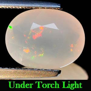 Natural Multi Color Opal 1.75 Ct. Oval Shape 10.4 x 8 Mm Gemstone From Ethiopia: Product ID: 818710586 Product Name: Natural Opal Weight: 1.75 CT. Size: 10.4 x 8 x 4.6 MM. Shape: Oval Color: Multi Color Clarity:Semi - Transparent Luster: Good Gems Origin: Ethiopia Treatment: Unhea