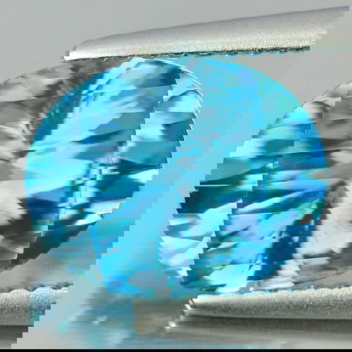 Natural Swiss Blue Topaz 3.28 Ct. Clean Oval Shape 10 x 7.9 Mm. Gemstone From Brazil: Product ID: 807166011 Product Name: Natural Blue Topaz Weight: 3.28 CT. Size: 10 x 7.9 x 5.8 MM. Shape: Oval Color: Blue Clarity:IF Luster: Good Gems Origin: Brazil Treatment: Treated Crystal Structur