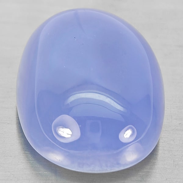 Natural Lavender Chalcedony 39.99 Ct. Oval Cabochon Shape 26 x 19.2 Mm Gemstone From Bussia: Product ID: 801502721 Product Name: Natural Weight: 39.99 CT. Size: 26 x 19.2 x 10.2 MM. Shape: Oval Cabochon Color: Lavender Clarity:Semi - Transparent Luster: Good Gems Origin: Russia Treatment: Unh