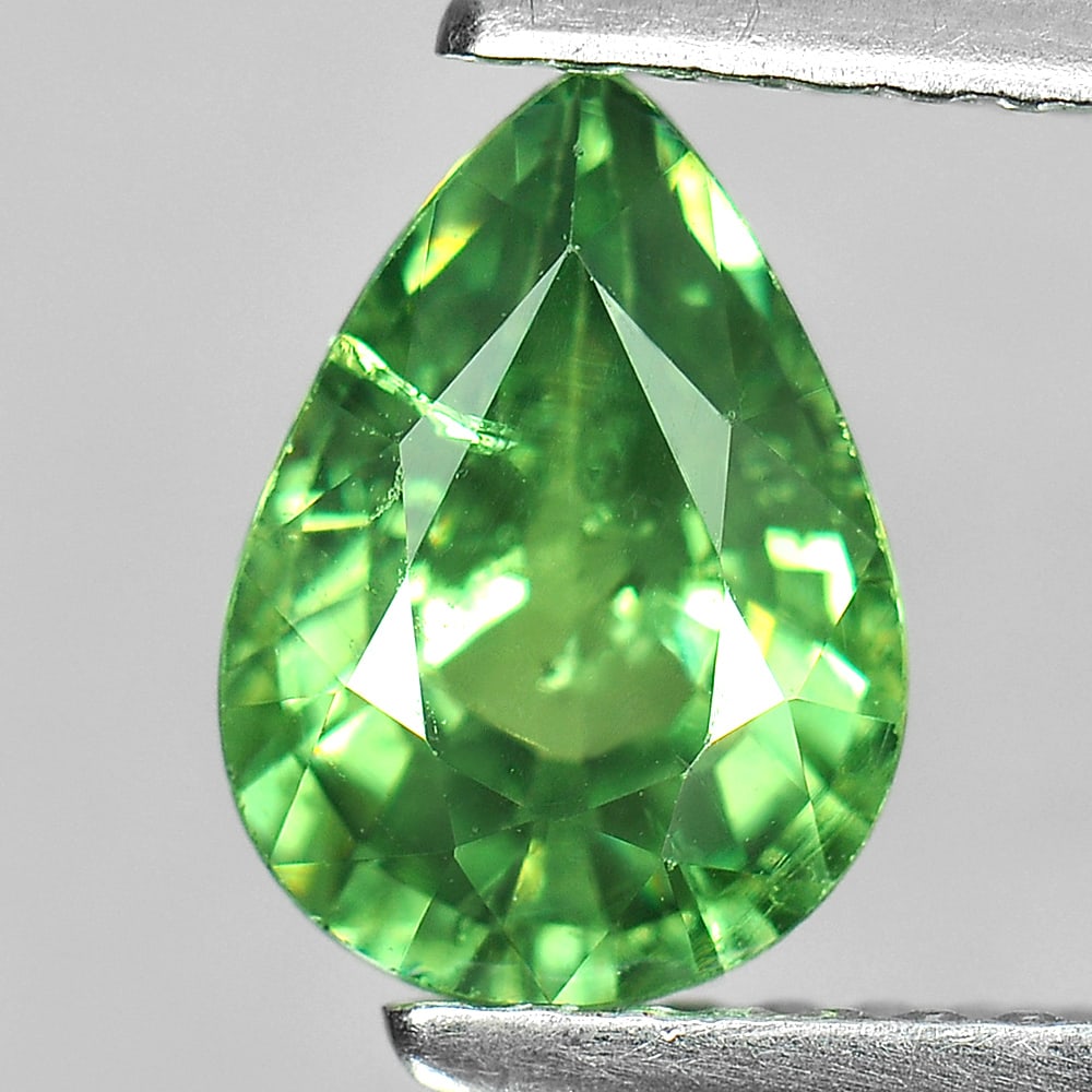 Natural Green Demantoid Garnet 1.42 Ct. Pear Shape 8.4 x 6 Mm. Gemstone from Madagascar: Product ID: 802929771 Product Name: Natural Demantoid Weight: 1.42 CT. Size: 8.4 x 6 x 3.8 MM. Shape: Pear Color: Green Clarity:SI1 Luster: Very Good Gems Origin: Madagascar Treatment: Unheated Crysta
