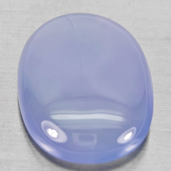 Natural Lavender Chalcedony 30.63 Ct. Oval Cabochon Shape 27 x 19.6 Mm Gemstone From Russia: Product ID: 801502725 Product Name: Natural Weight: 30.63 CT. Size: 27 x 19.6 x 7.6 MM. Shape: Oval Cabochon Color: Lavender Clarity:Semi - Transparent Luster: Good Gems Origin: Russia Treatment: Unhe
