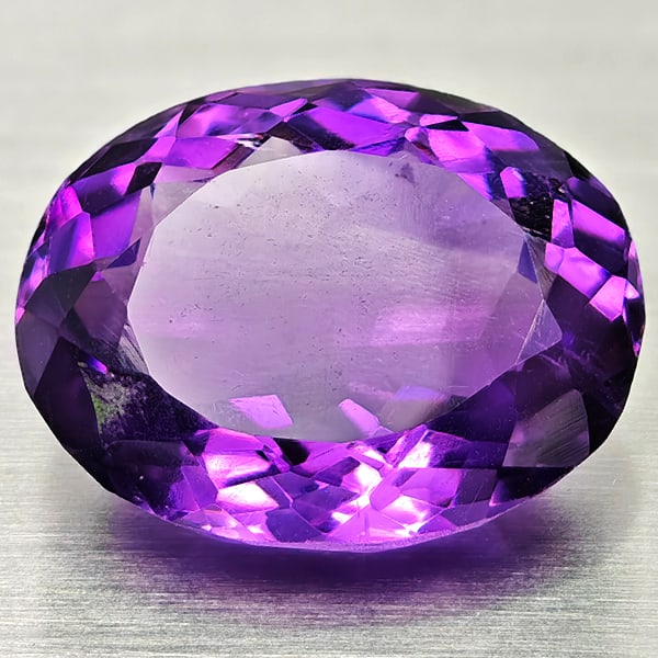 Natural Purple Amethyst 10.40 Ct. Oval Shape 15.9 x 12.4 Mm Gemstone from Brazil: Product ID: 800325448 Product Name: Natural Amethyst Weight: 10.40 CT. Size: 15.9 x 12.4 x 8.3 MM. Shape: Oval Color: Purple Clarity:VSI Luster: Good Gems Origin: Brazil Treatment: Unheated Crystal St