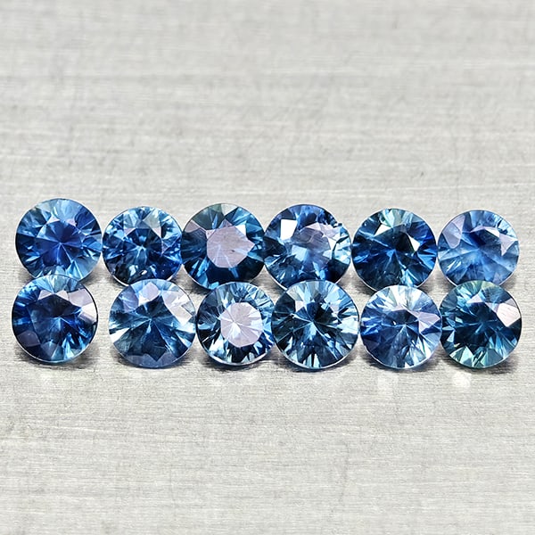 Natural Blue Sapphire 0.86 Ct. 12 Pcs Round Diamond Cut 2.5 Mm Gemstones From Madagascar: Product ID: 806162618 Product Name: Natural Blue Sapphire Weight: 0.86 CT. Size: 2.5 x 2.5 x 1.7 MM. Shape: Round Diamond Cut Color: Blue Clarity:VVS Luster: Good Gems Origin: Madagascar Treatment: He