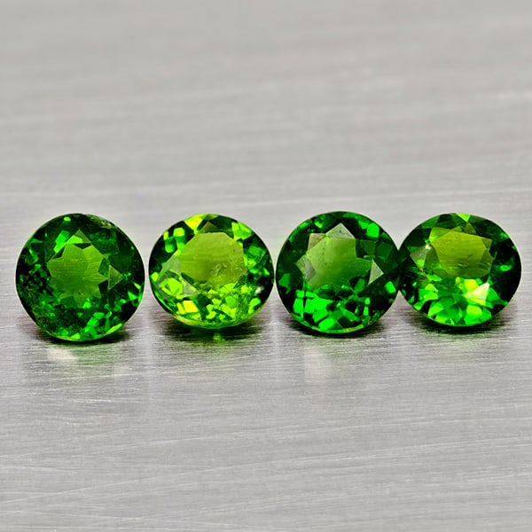Natural Green Chrome Diopside 1.99 Ct. 4 Pcs. Round Shape Gemstones: Product ID: 801608009 Product Name: Natural Chrome Diopside Weight: 1.99 CT. Size: 5.1 x 5.1 x 3.2 to 4.9 x 4.9 x 2.8 MM. Shape: Round Color: Green Clarity:VSI - SI1 Luster: Good Gems Origin: Russia T