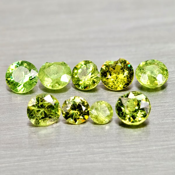 Natural Yellowish Green Demantoid Garnet 1.03 Ct. 9 Pcs Round Diamond Cut Gemstones From Madagascar: Product ID: 802936576 Product Name: Natural Demantoid Weight: 1.03 CT. Size: 3.2 x 3.2 x 2 to 2.2 x 2.2 x 1.4 MM. Shape: Round Diamond Cut Color: Yellowish Green Clarity:VSI - SI1 Luster: Good Gems Or
