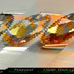 Natural Multi Color Titanium Sphene Rainbow Spark 5.16 Ct. Oval Shape 11.2 x 10.5 Mm. Gemstone: Product ID: 806507753 Product Name: Natural Sphene Weight: 5.16 CT. Size: 11.2 x 10.5 x 5.5 MM. Shape: Oval Color: Multi Color With Rainbow Spark Clarity:VSI Luster: Good Gems Origin: Madagascar Treat