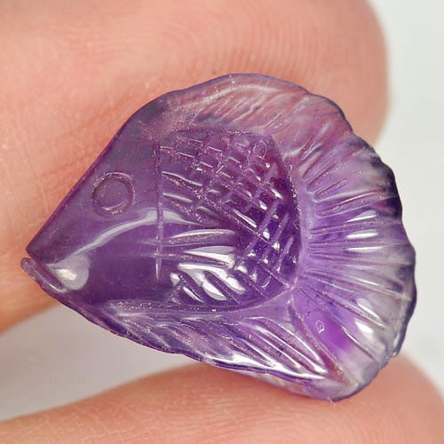 Natural Purple Amethyst 9.45 Ct. Fish Carving Shape 19.4 x 14.4 Mm. Unheated Gemstone From Brazil: Product ID: 810303026 Product Name: Natural Amethyst Weight: 9.45 CT. Size: 19.4 x 14.4 x 6.7 MM. Shape: Fish Carving Color: Purple Clarity:Semi - Transparent Luster: Good Gems Origin: Brazil Treatmen