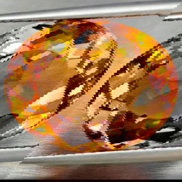 Natural Imperial Topaz 13.60 Ct. Oval Shape 17 x 12.9 Mm Gemstone From Brazil: Product ID: 807168603 Product Name: Natural Topaz Weight: 13.60 CT. Size: 17 x 12.9 x 7.9 MM. Shape: Oval Shape Color: Imperial Clarity:VSI Luster: Good Gems Origin: Brazil Treatment: Treated Crystal