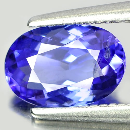 Natural Violetish Blue Tanzanite 1.06 Ct. Oval Shape 7.9 x 5.3 Mm. Gemstone From Tanzania: Product ID: 807006359 Product Name: Natural Tanzanite Weight: 1.06 CT. Size: 7.9 x 5.3 x 3.4 MM. Shape: Oval Color: Violetish Blue Clarity:SI Luster: Good Gems Origin: Tanzania Treatment: Heated Cryst