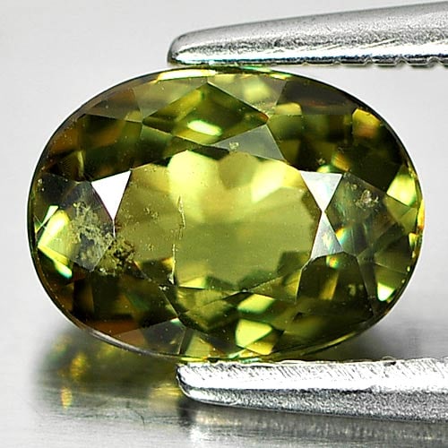 Natural Green Demantoid Garnet 1.33 Ct. Oval Shape 7.4 x 5.6 Mm. Gemstone Unheated From Madagascar: Product ID: 802930707 Product Name: Natural Demantoid Weight: 1.33 CT. Size: 7.4 x 5.6 x 3.7 MM. Shape: Oval Color: Green Clarity:SI1 Luster: Very Good Gems Origin: Madagascar Treatment: Unheated Crys