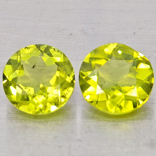 Natural Green Peridot 1.58 Ct. 2 Pcs Round Shape 5.9 Mm Gemstones from Pakistan: Product ID: 805317507 Product Name: Natural Rhodolite Weight: 1.58 CT. Size: 5.9 x 5.9 x 3.2 MM. Shape: Round Color: Green Clarity:VSI Luster: Good Gems Origin: Pakistan Treatment: Unheated Crystal St