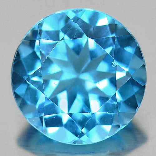 Natural Swiss Blue Topaz 2.81 Ct. Round Shape 8.9 Mm Gemstone From Brazil: Product ID: 807156353 Product Name: Natural Blue Topaz Weight: 2.81 CT. Size: 8.9 x 8.9 x 5.4 MM. Shape: Round Color: Blue Clarity:VSI Luster: Very Good Gems Origin: Brazil Treatment: Treated Crystal