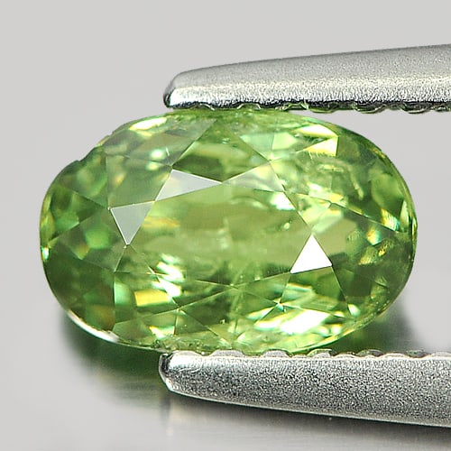 Certified Natural Green Demantoid Garnet 0.85 Ct. Oval Shape 4.48 x 6.83 Mm. Gemstone From: Product ID: 802922056 Product Name: Natural Demantoid Weight: 0.85 CT. Size: 4.48 x 6.83 x 2.96 MM. Shape: Oval Color: Green Clarity:SI Luster: Good Gems Origin: Mardagascar Treatment: Unheated Crysta